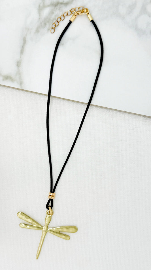 Black cord necklace with gold dragonfly pendant