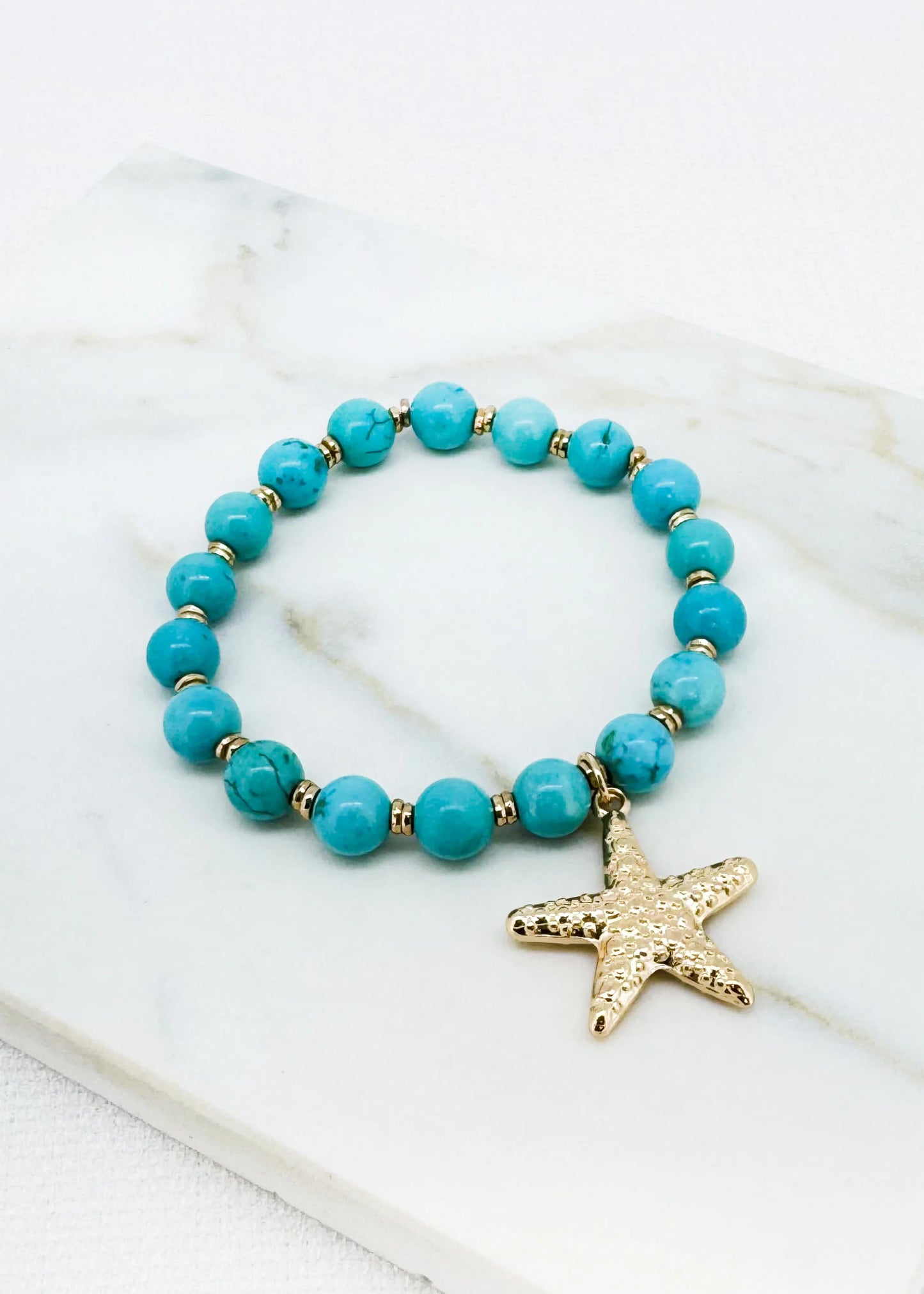 Turquoise bead stretch bracelet with gold starfish