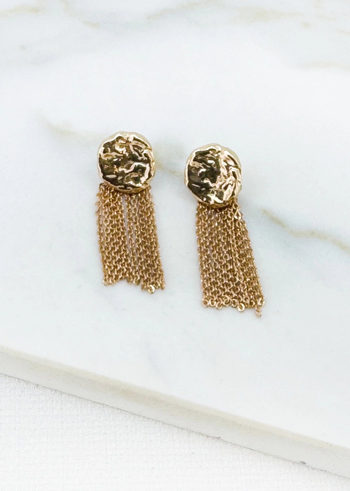 Gold hammed disc and tassel chain earring